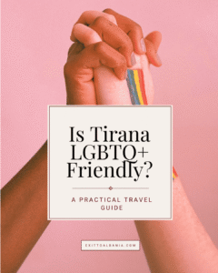 Two hands held together with a small rainbow icon, featuring the text overlay "Is Tirana LGBTQ+ Friendly? A Practical Travel Guide" for Exit to Albania.